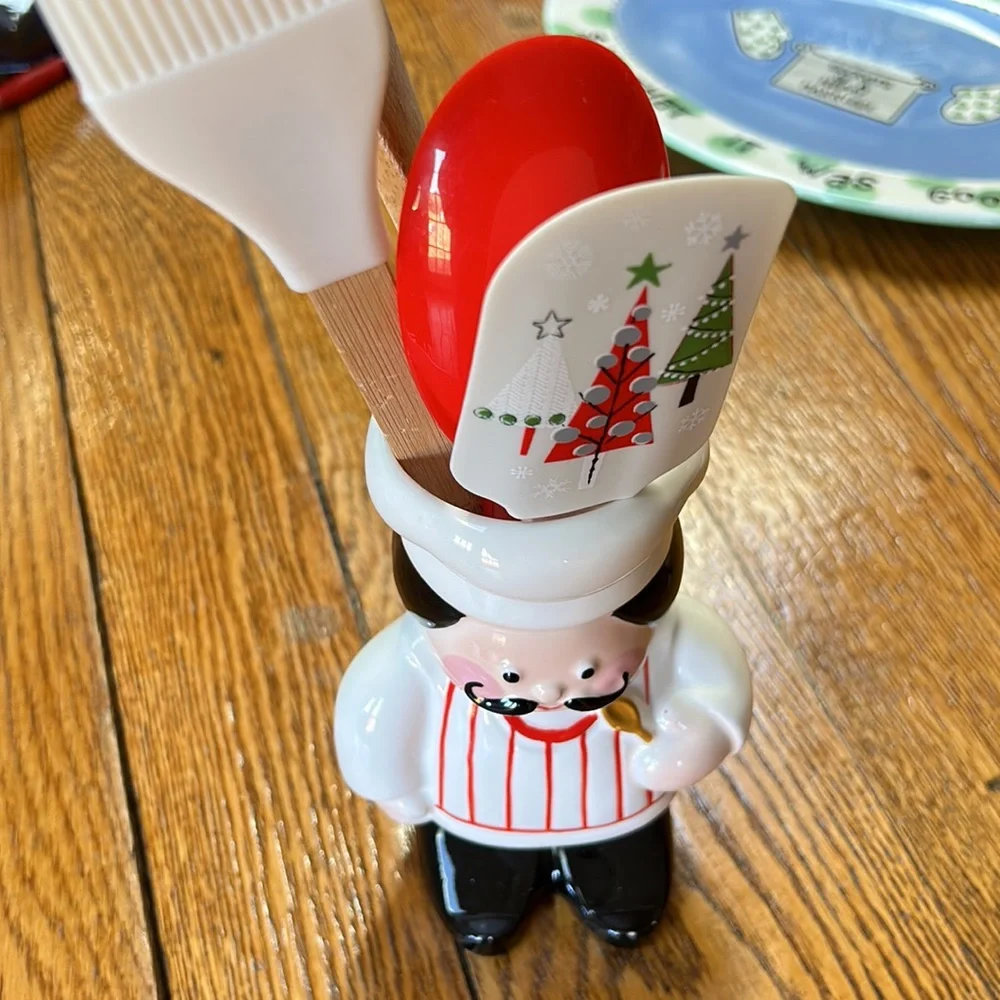 Vintage Avon Chef Andre utensil holder. Approximately 7” tall.